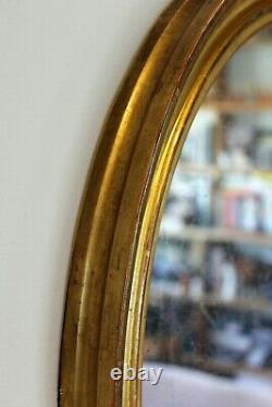 Pair of Antique Gilt Oval Mirrors with Silver Verre Eglomise glass plates