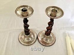 Pair of Arts and Crafts A E Jones silver plated candlesticks