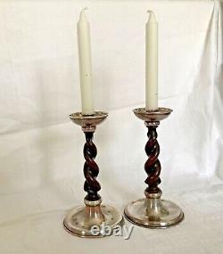 Pair of Arts and Crafts A E Jones silver plated candlesticks