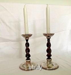 Pair of Arts and Crafts A E Jones silver plated candlesticks