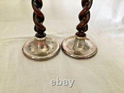 Pair of Arts and Crafts A E Jones silver plated candlesticks