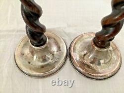 Pair of Arts and Crafts A E Jones silver plated candlesticks