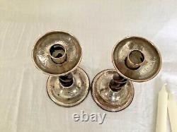 Pair of Arts and Crafts A E Jones silver plated candlesticks