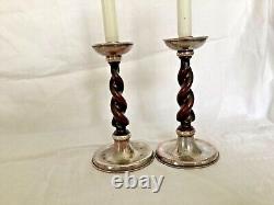 Pair of Arts and Crafts A E Jones silver plated candlesticks