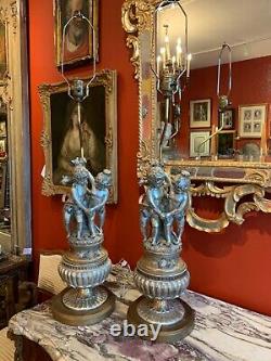 Pair of Early Century Figurative Silver Plated Porcelain Lamps
