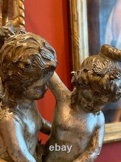 Pair of Early Century Figurative Silver Plated Porcelain Lamps