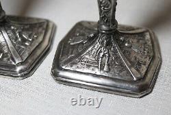 Pair of antique ornate Jennings Brothers silver-plated candlesticks holders