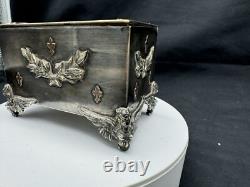 Rare Antique Small Silver Plate Figural footed Jewelry Box with Applied Gold Piece