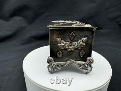 Rare Antique Small Silver Plate Figural footed Jewelry Box with Applied Gold Piece