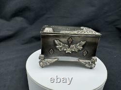 Rare Antique Small Silver Plate Figural footed Jewelry Box with Applied Gold Piece