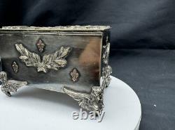 Rare Antique Small Silver Plate Figural footed Jewelry Box with Applied Gold Piece