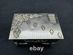 Rare Antique Small Silver Plate Figural footed Jewelry Box with Applied Gold Piece