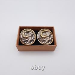 Silver and 24K Gold Plated Swirl Clip-on Earrings by Nurit and Shoshanna Bar-On