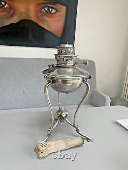 Silver plate original oil lamp in the manner of WAS Benson Hinks on triform legs