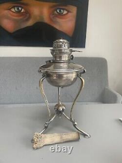 Silver plate original oil lamp in the manner of WAS Benson Hinks on triform legs