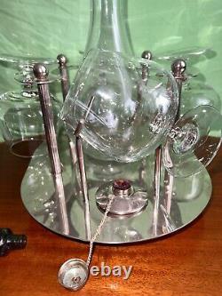 Silver plated brandy warmer-stand for four classes and decanter, very Rare. SILEA