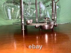 Silver plated brandy warmer-stand for four classes and decanter, very Rare. SILEA