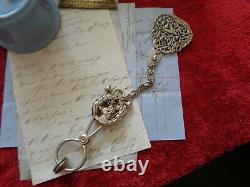 Victorian Nickel plated brass skirt lifter belt clip and chain