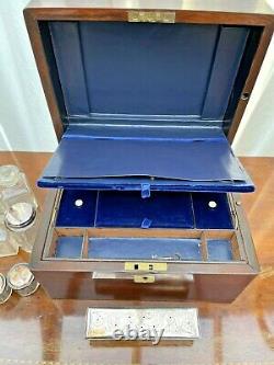 Victorian mahogany vanity box with silver plate topped bottles/jars