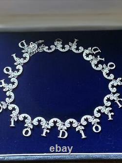 Vintage Christian Dior crystal logo necklace