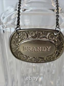 Vintage Of crystal decanters with silver-plated