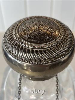 Vintage Of crystal decanters with silver-plated