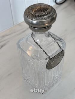 Vintage Of crystal decanters with silver-plated