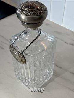 Vintage Of crystal decanters with silver-plated