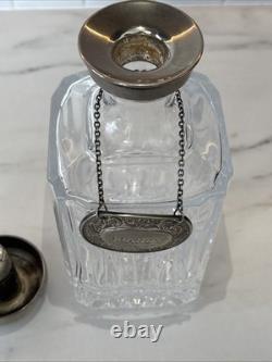 Vintage Of crystal decanters with silver-plated