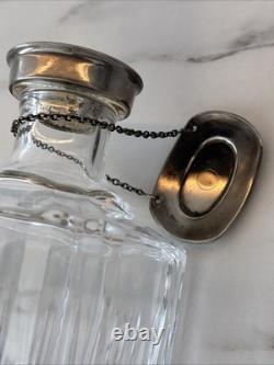 Vintage Of crystal decanters with silver-plated