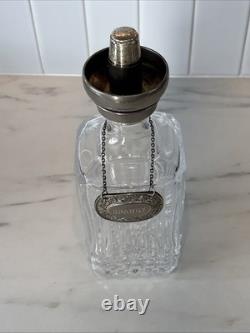 Vintage Of crystal decanters with silver-plated