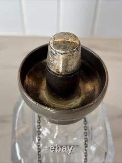 Vintage Of crystal decanters with silver-plated