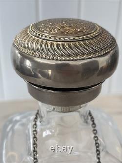 Vintage Of crystal decanters with silver-plated