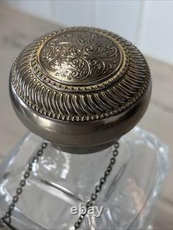 Vintage Of crystal decanters with silver-plated