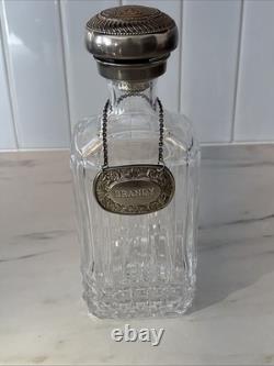 Vintage Of crystal decanters with silver-plated