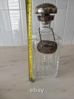 Vintage Of crystal decanters with silver-plated