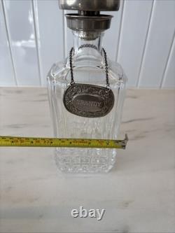 Vintage Of crystal decanters with silver-plated