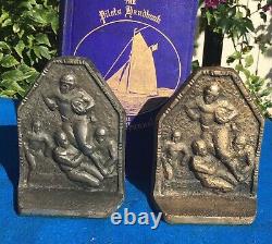 Vintage silver-plated football bookends, leather helmets, circa 1920s