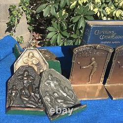 Vintage silver-plated football bookends, leather helmets, circa 1920s