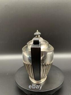 Vintage silver plated teapot inscribed CUTLERS NORWICH